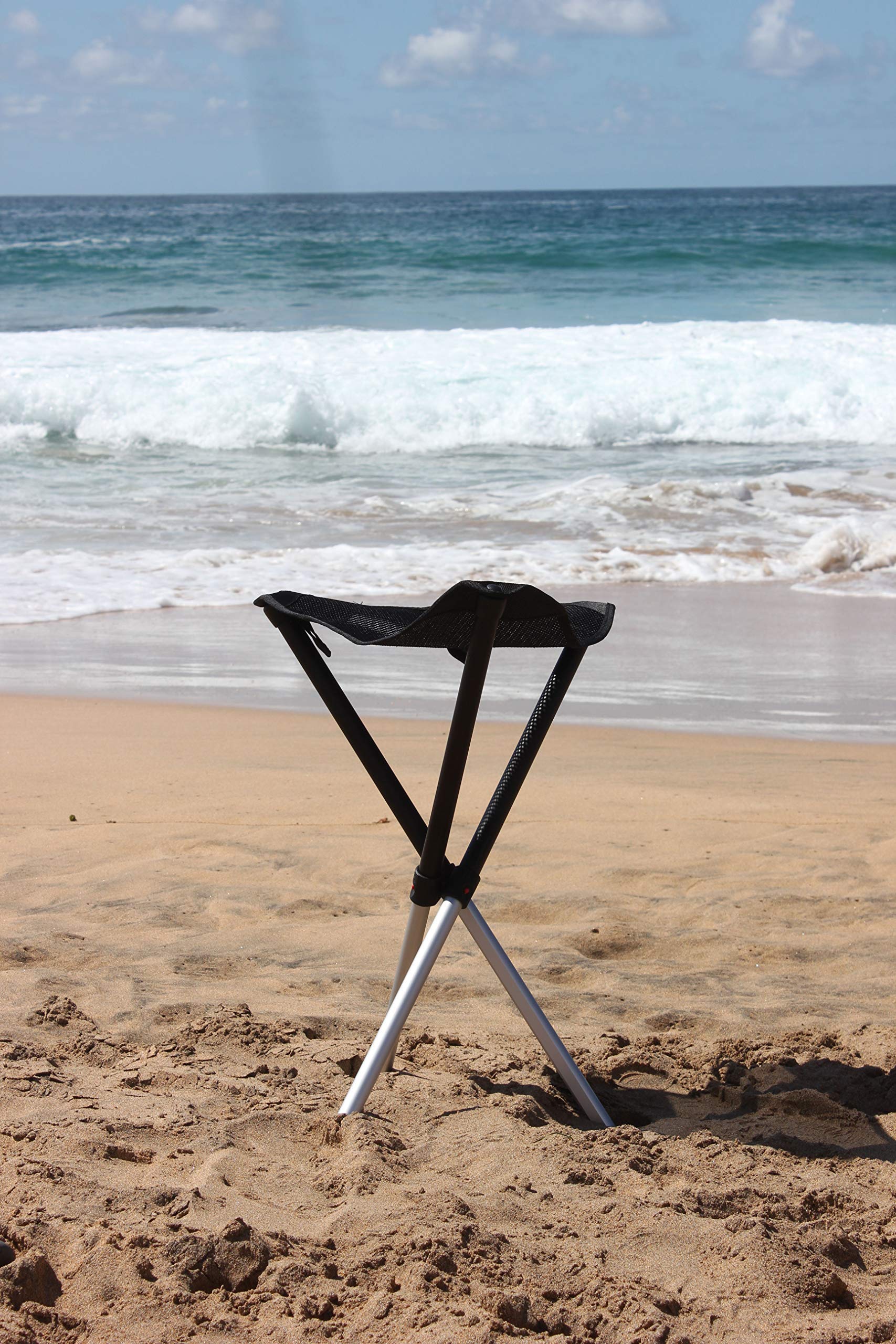 Walkstool next to backpack showing scale and travel-friendly size benefit