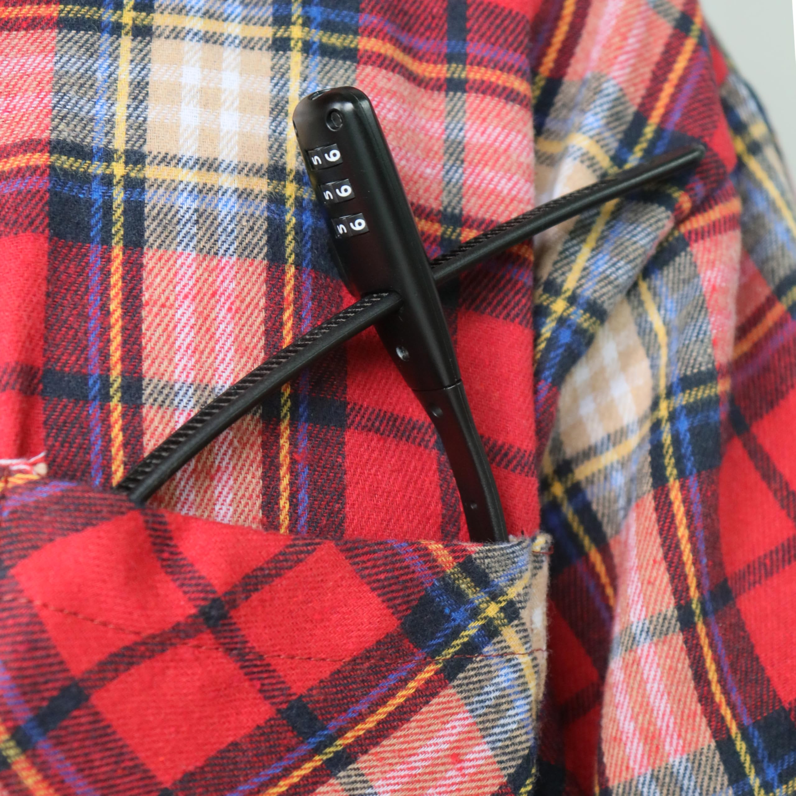 WARLION lock held in hand to illustrate compact size and travel convenience