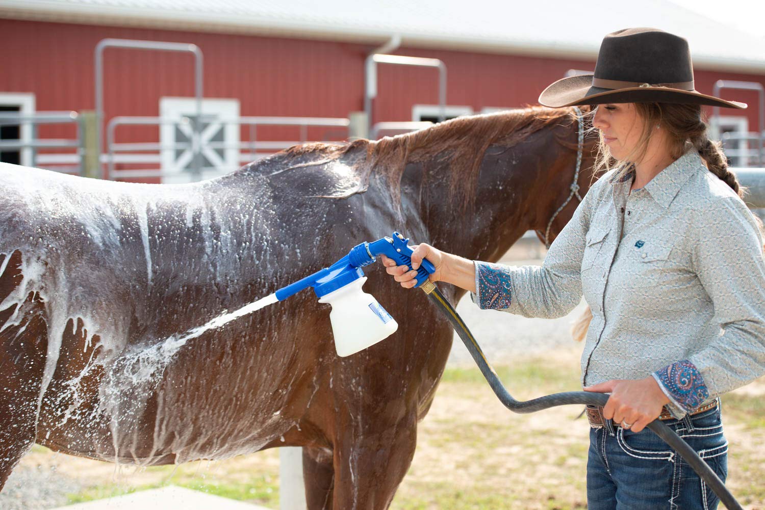 Weaver Equine close-up of nine-position rinse attachment showing adjustable spray control benefits