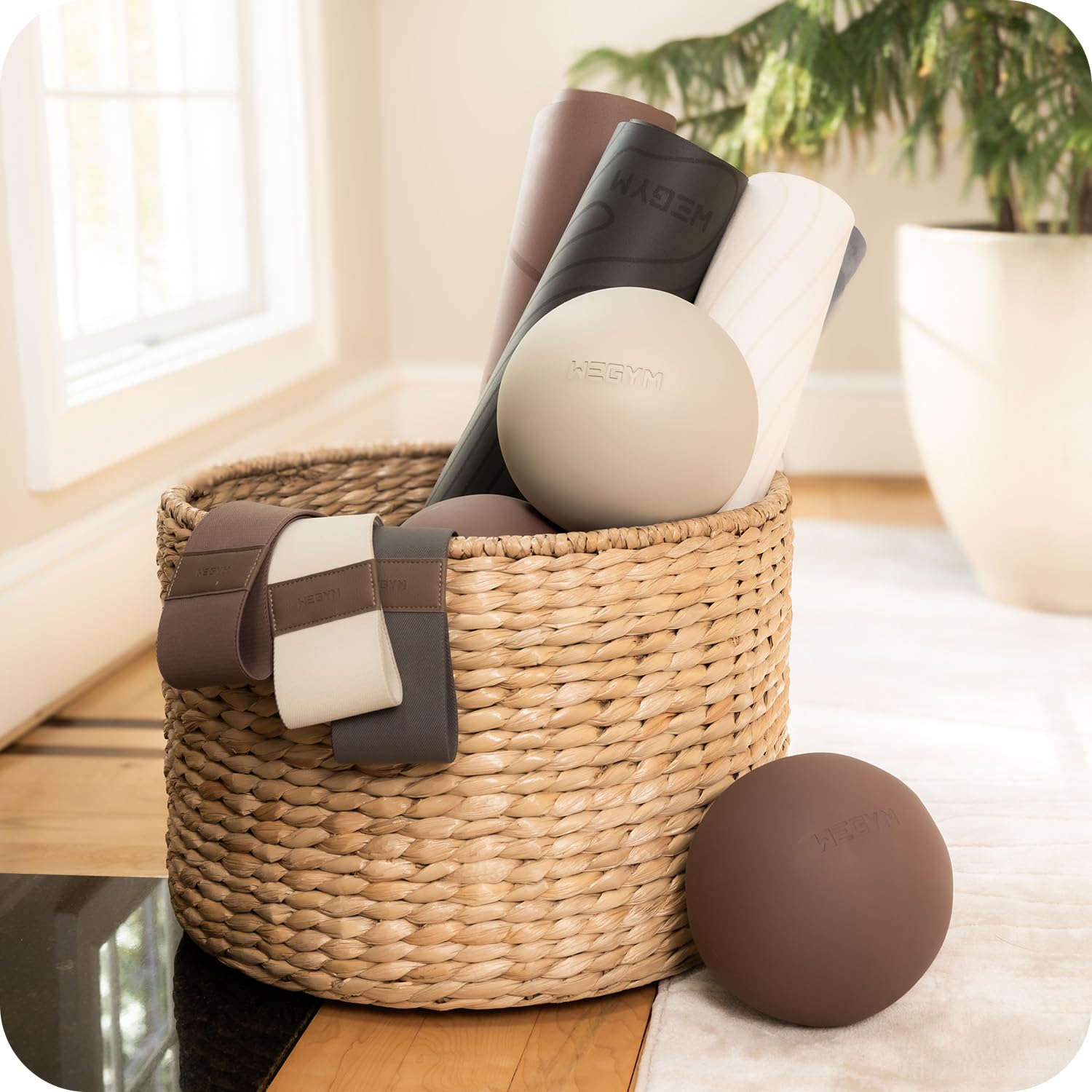 WeGym pilates ball with pump and valve detail for quick inflation convenience