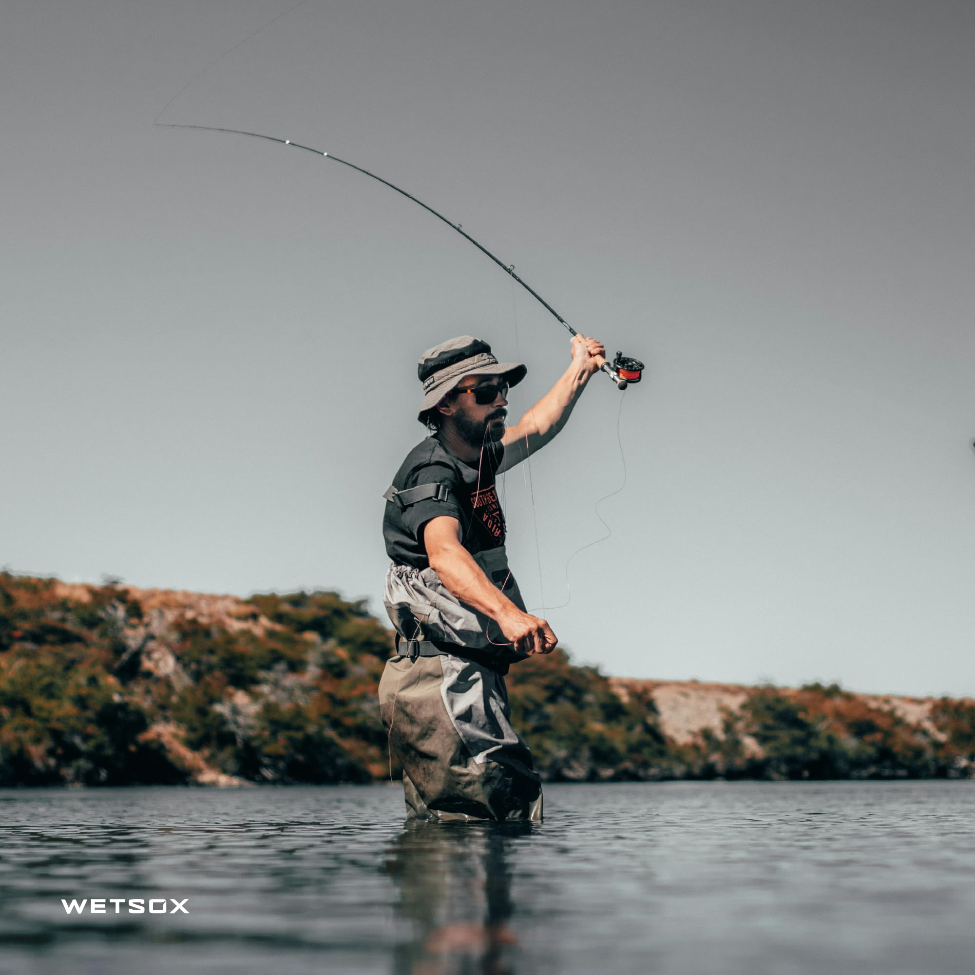 Wetsox sock in use as foot slides easily into wader demonstrating frictionless entry
