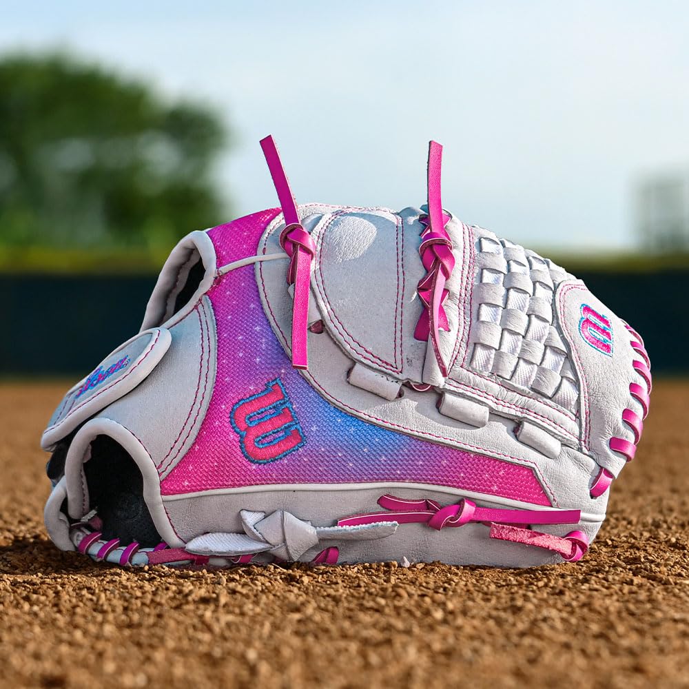 Wilson A440 Flash laid with bat showing versatile practice-to-game readiness benefit