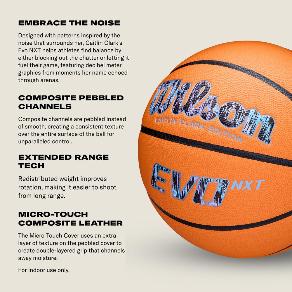 WILSON Embrace ball held in hand during dribble demonstrating soft core fingertip control