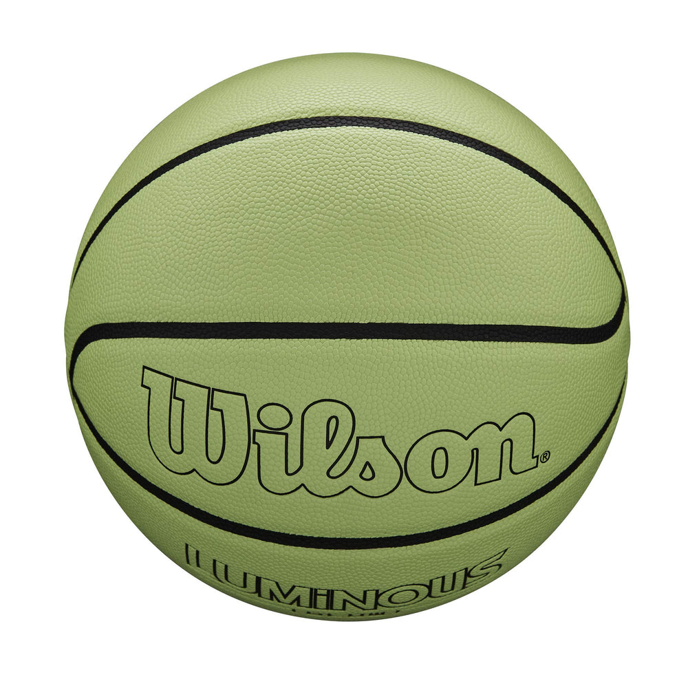 Wilson basketball in mid-dribble on court showing durable construction and play-ready performance