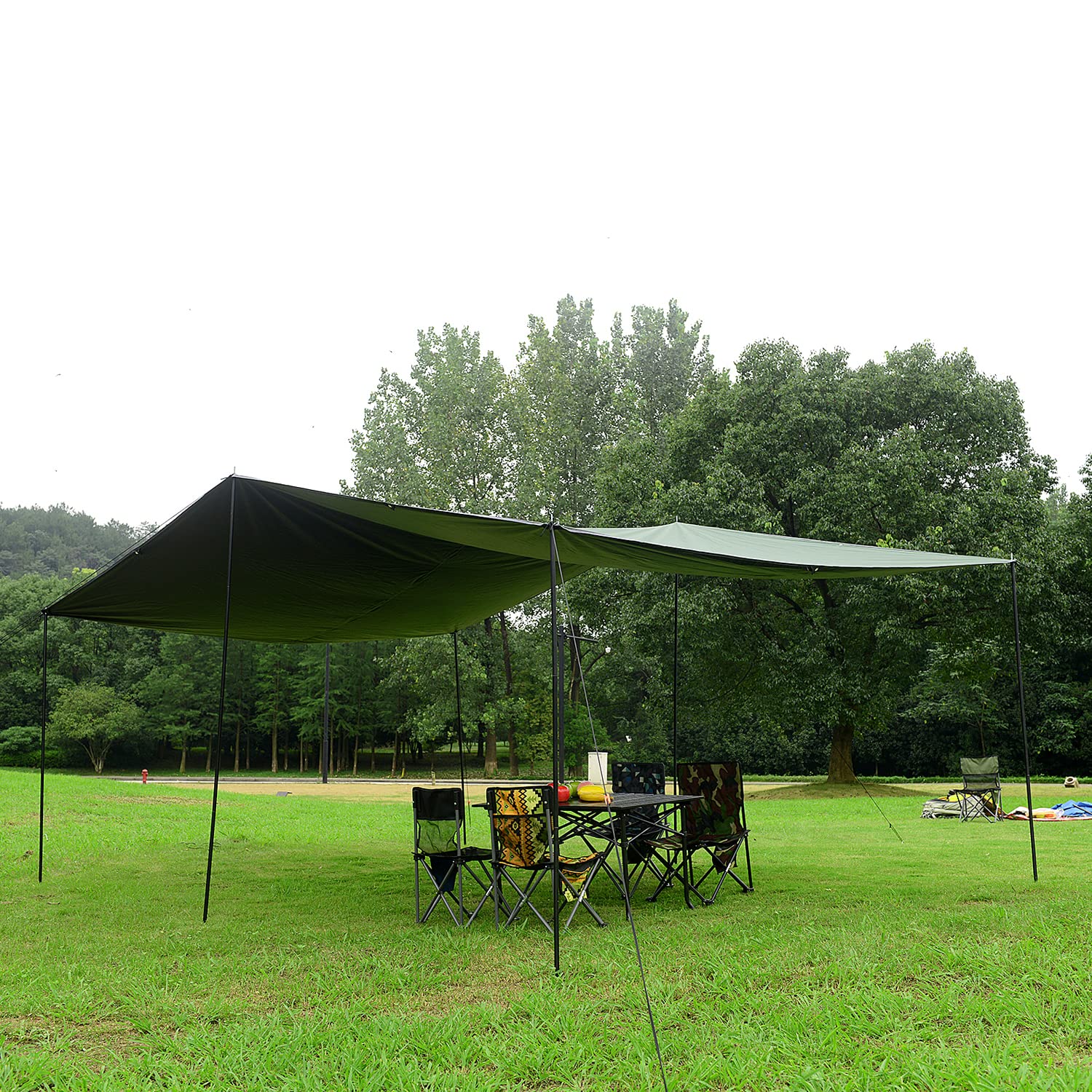 Wind Tour tarp overhead with people underneath showing actual coverage area