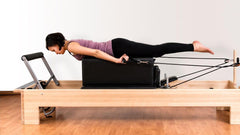 WINDFOOT box placed on reformer carriage demonstrating compatibility and secure placement