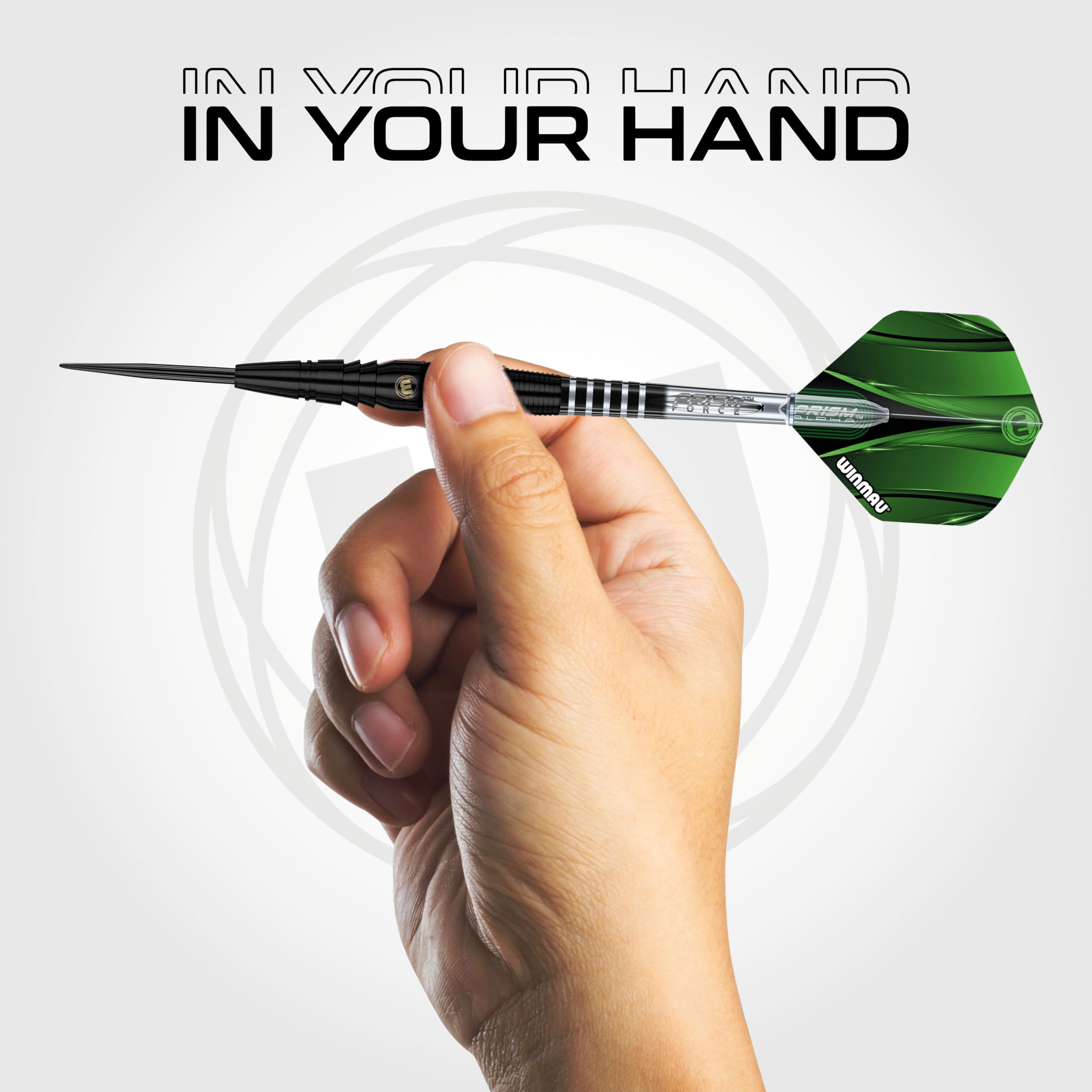 Winmau Sniper Black beside a coin showing compact 7.9 x 48.3 mm profile for tighter groupings