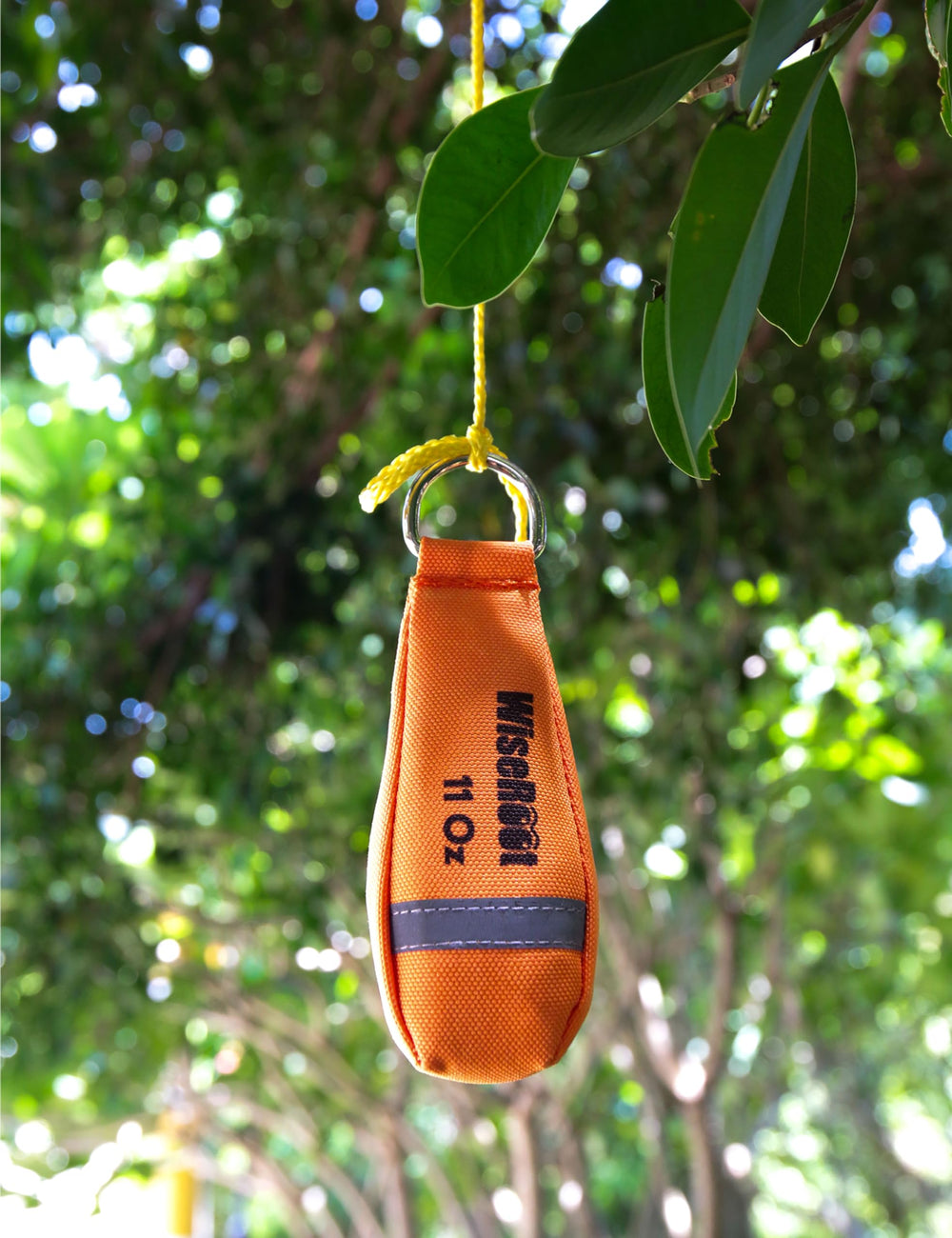 WISEROOT kit next to a hand showing compact size and easy transport