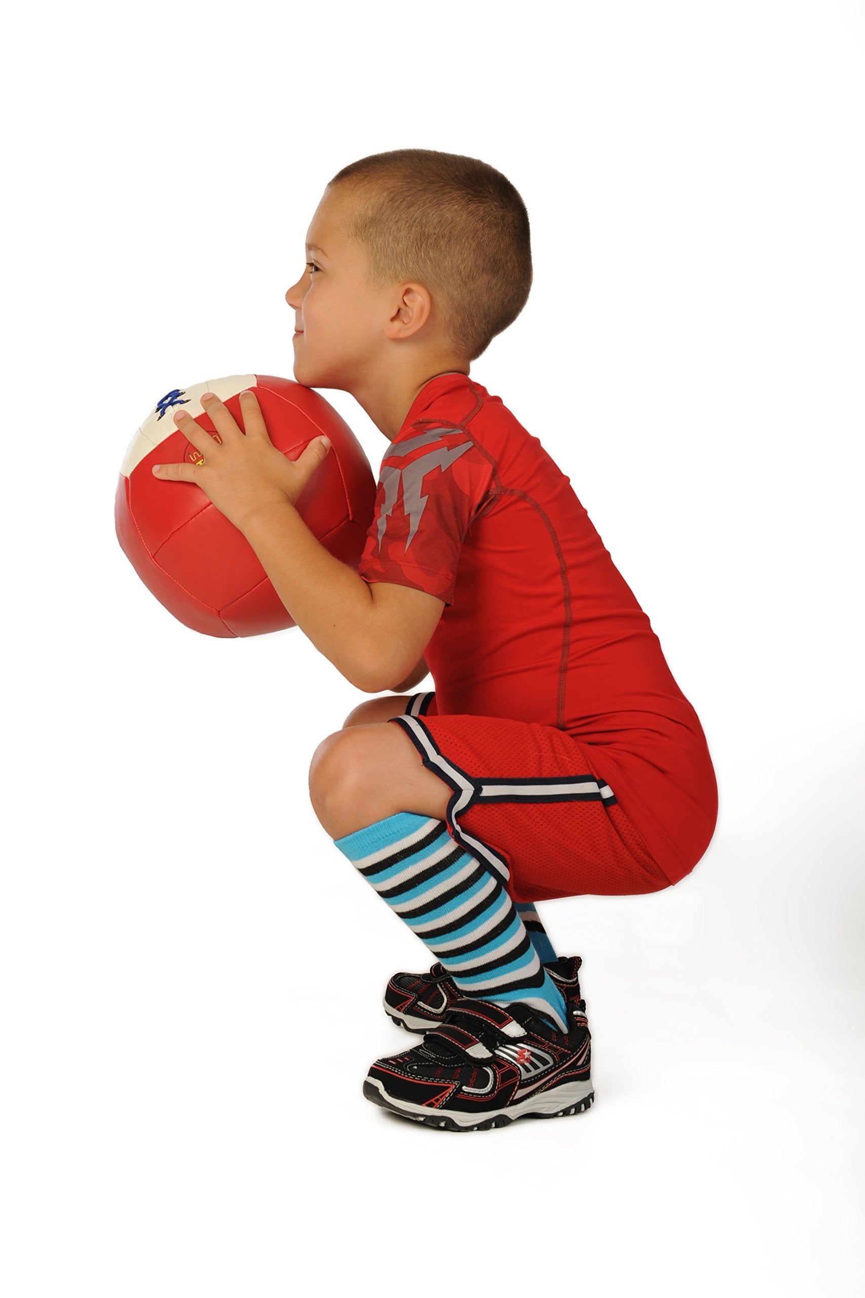 WOD Toys Med Ball Mini beside a standard soccer ball showing size comparison