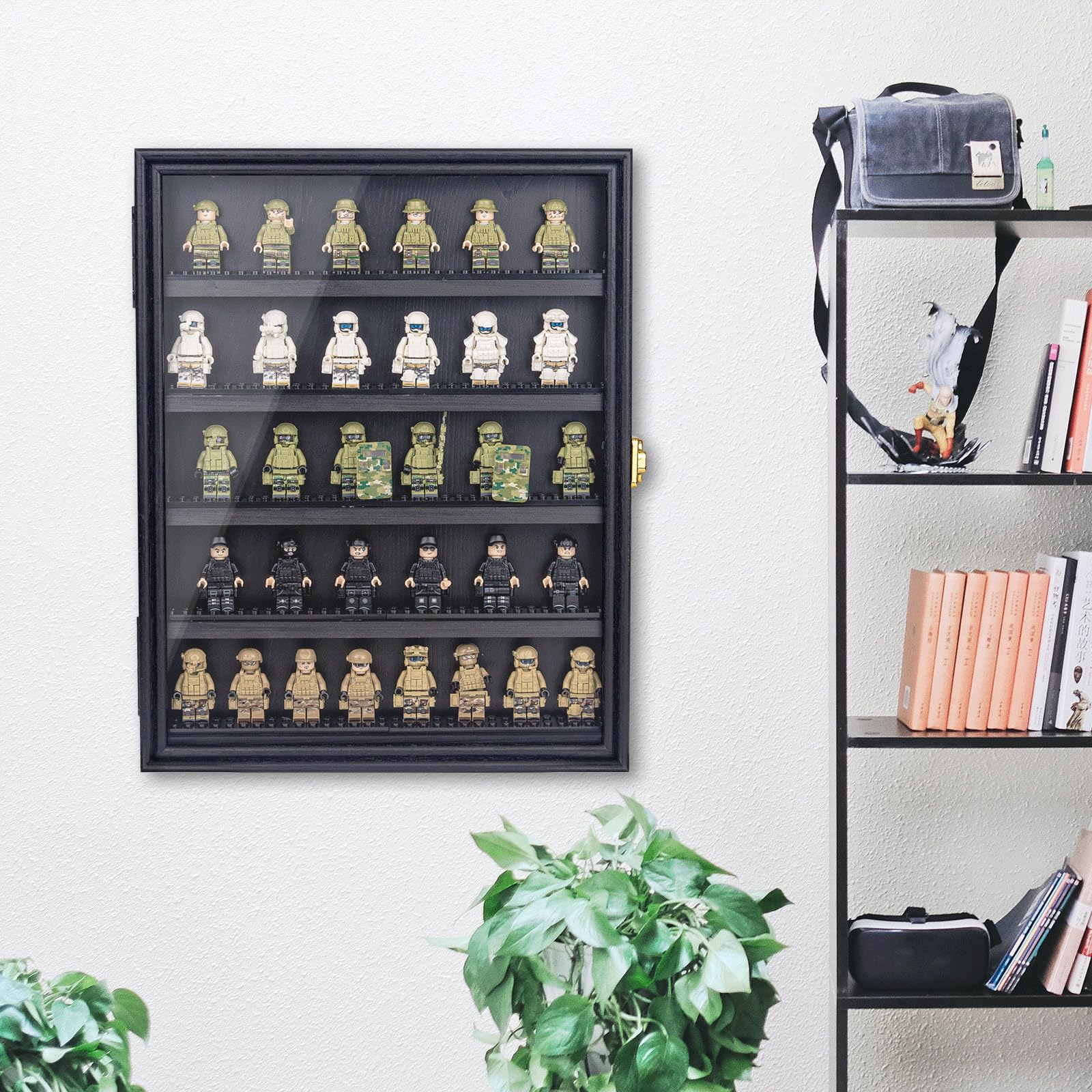 WodGod case with figurines for scale comparison and efficient space use