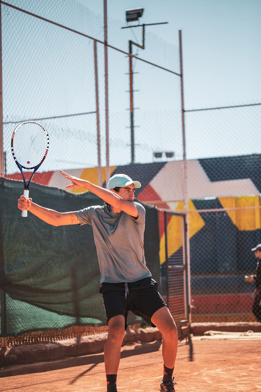 WOED BATENS player hitting on-court demonstrating control and maneuverability benefit