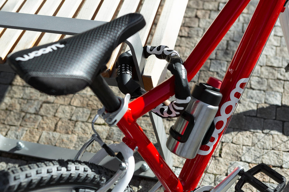 woom Glug in lifestyle ride scene showing convenience during kids' cycling