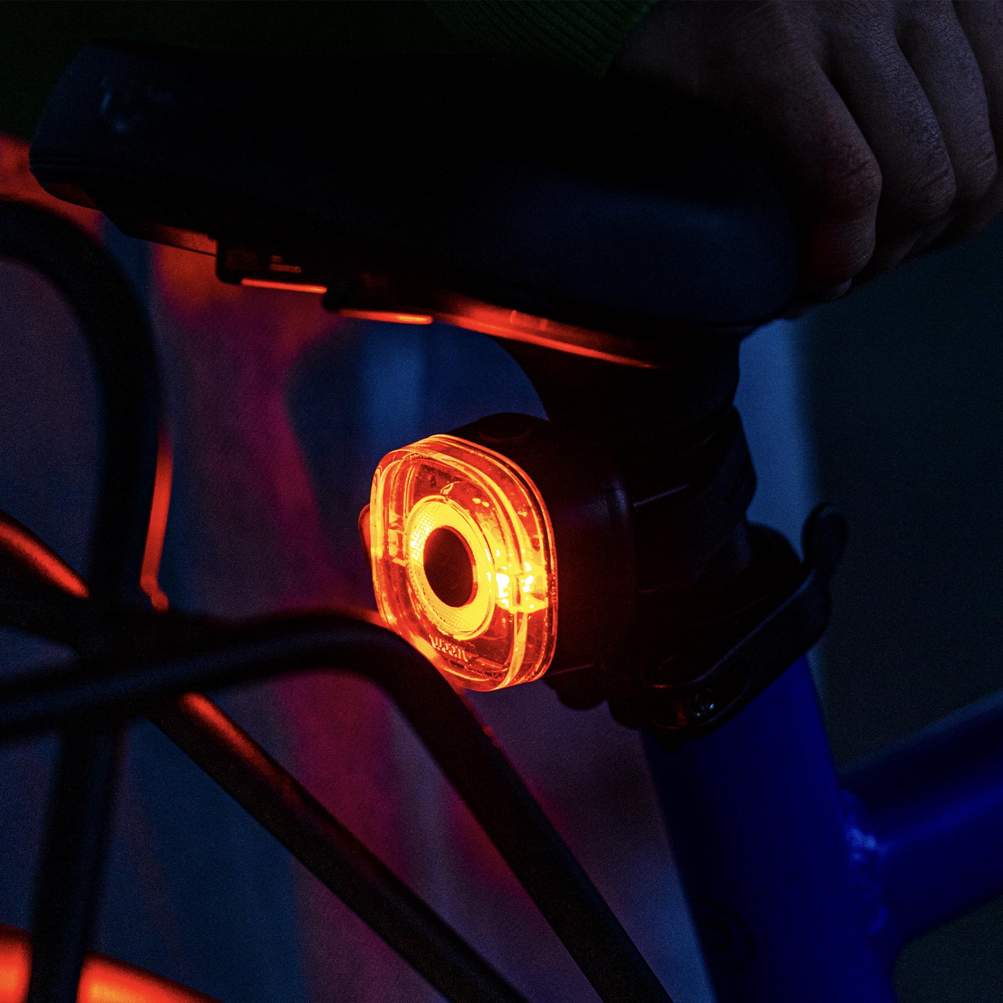woom light mounted on handlebar while child rides demonstrating clear illumination