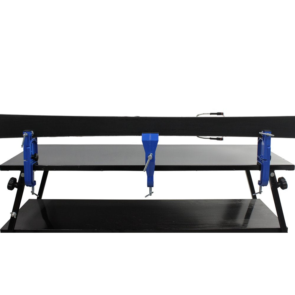 XCMAN installation clamped to a workbench for fast setup convenience