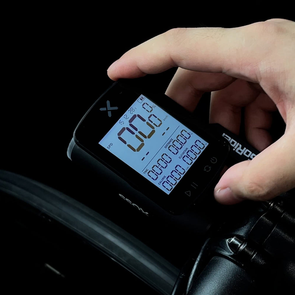 XOSS G+ Gen2 mounted on bike with sensors showing robust weather protection