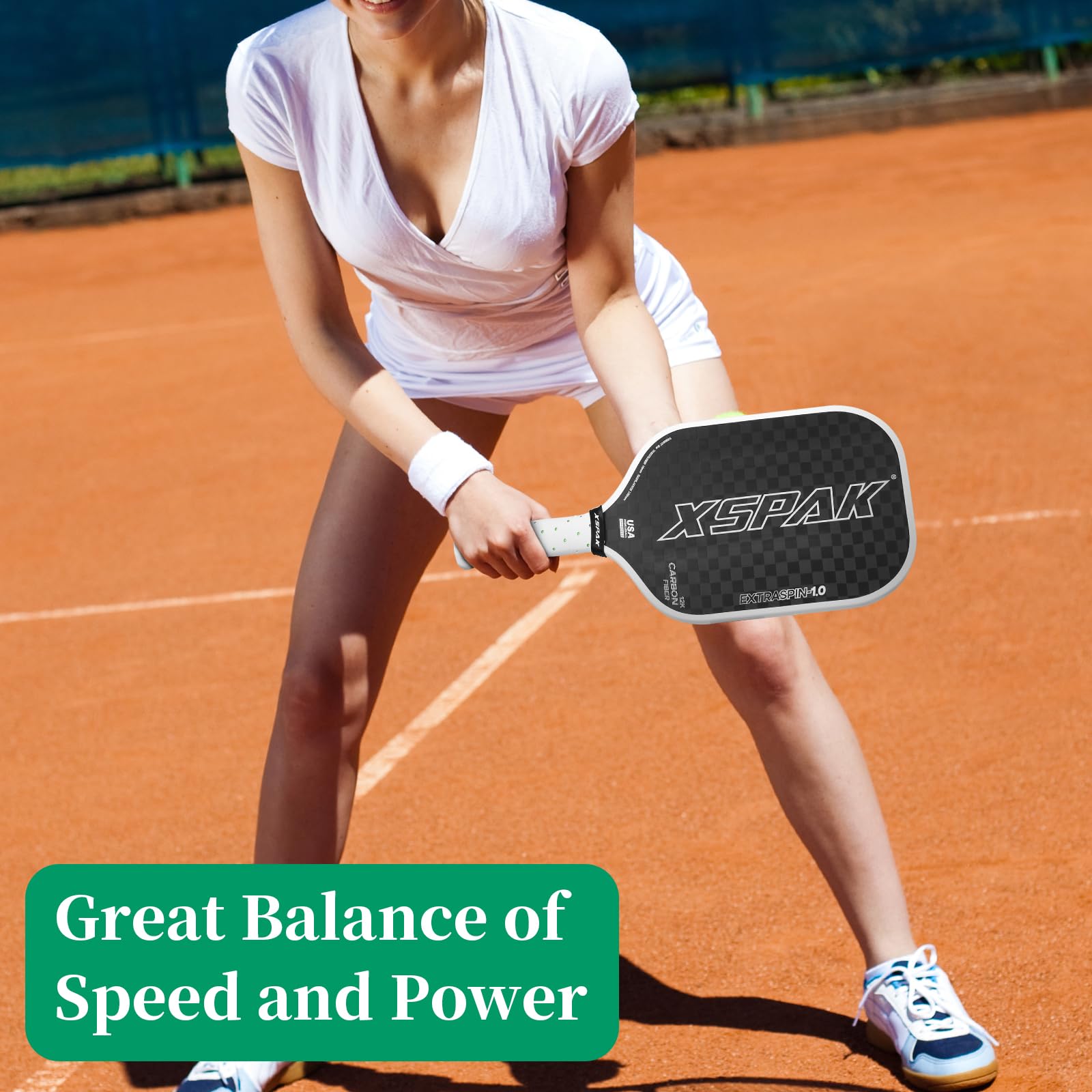 XS XSPAK paddle in play showing reliable shot placement during volley rallies