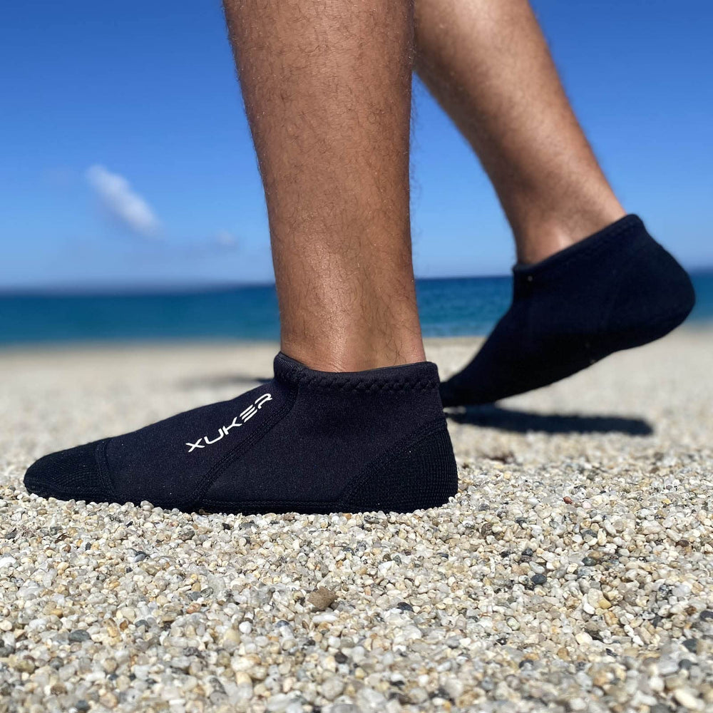 XUKER sole closeup texture highlighting coated anti-abrasion grip for stability