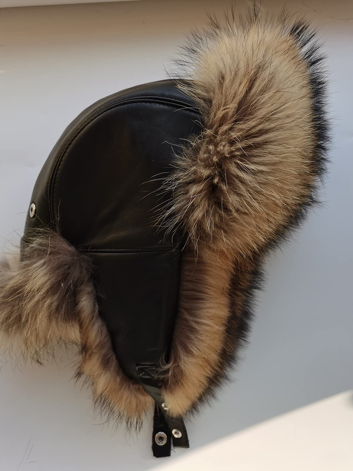 XUYUZUAU lifestyle image of hat worn outdoors showing protection in snow