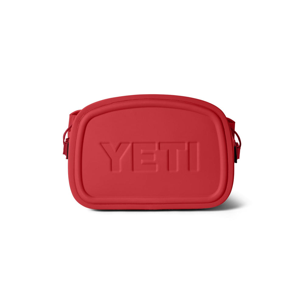 YETI Hopper M20 beside water bottle showing portable 20-liter scale