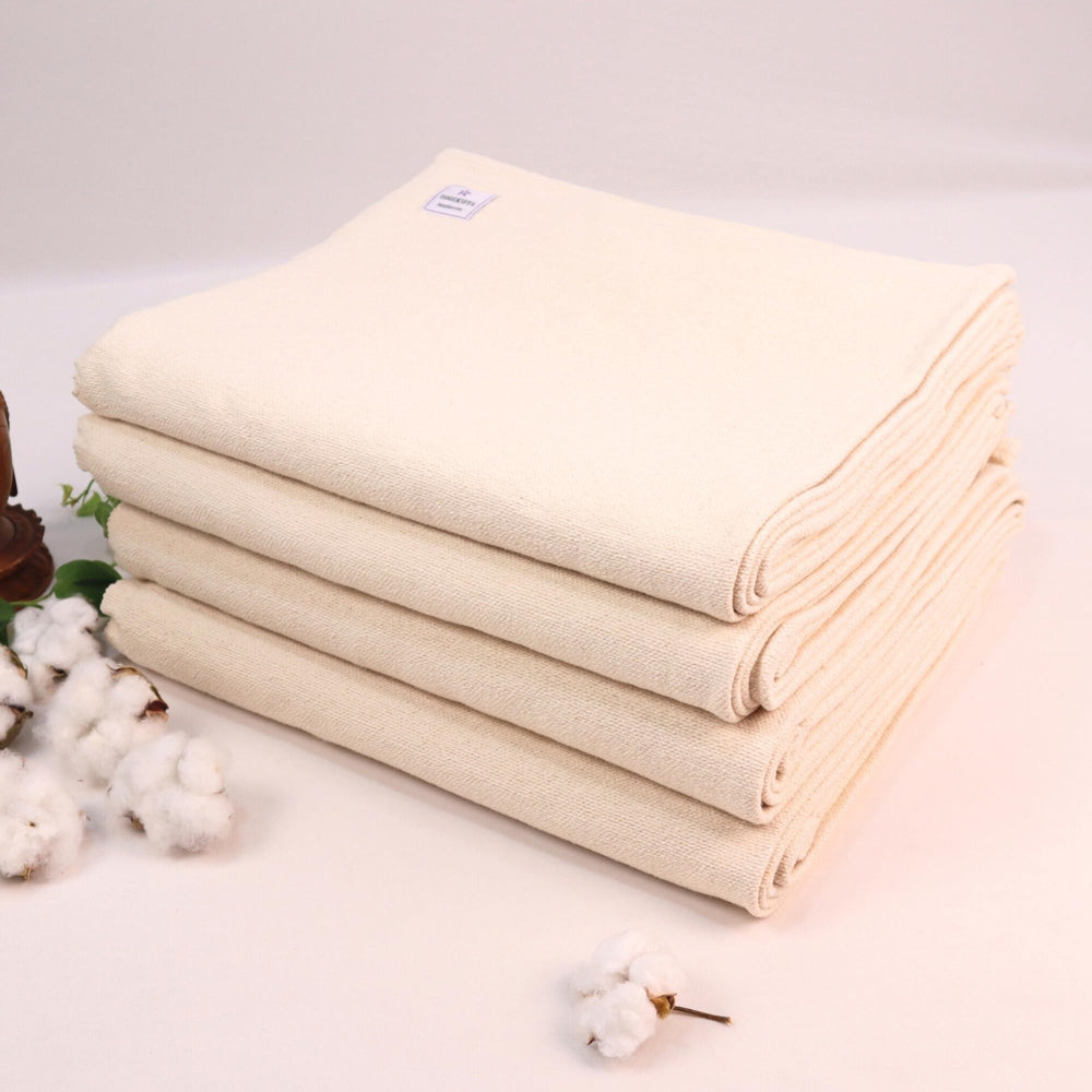 Yogikuti blanket used as beach mat outdoors showing versatile, breathable comfort