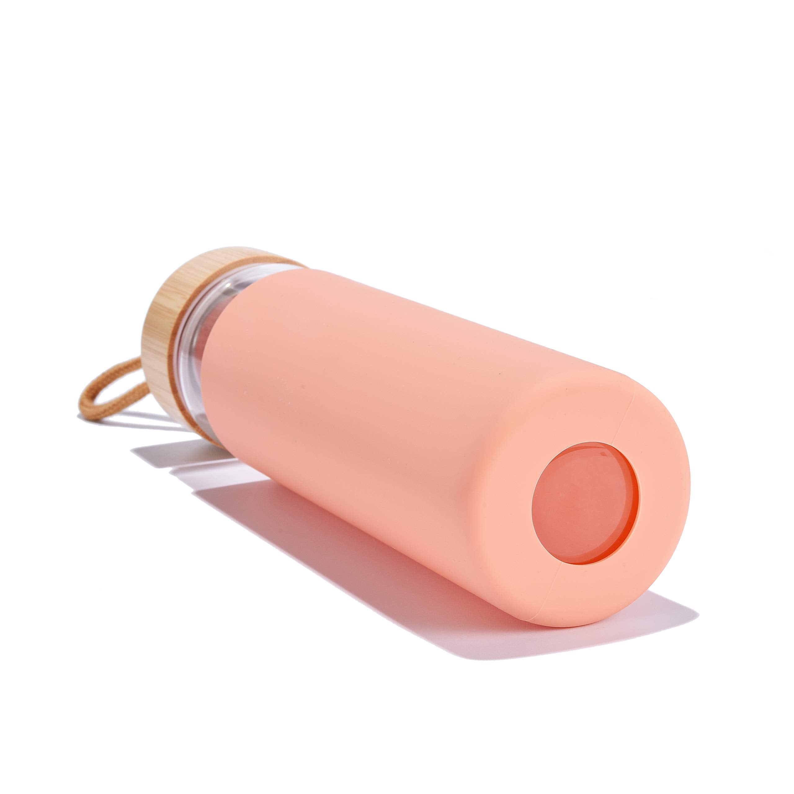 Yomious bottle on picnic blanket showing stylish outdoor hydration