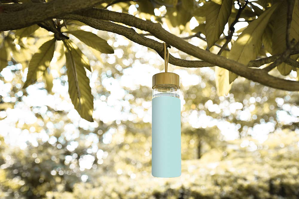 Yomious bottle on a trail demonstrating outdoor use and durable design benefit