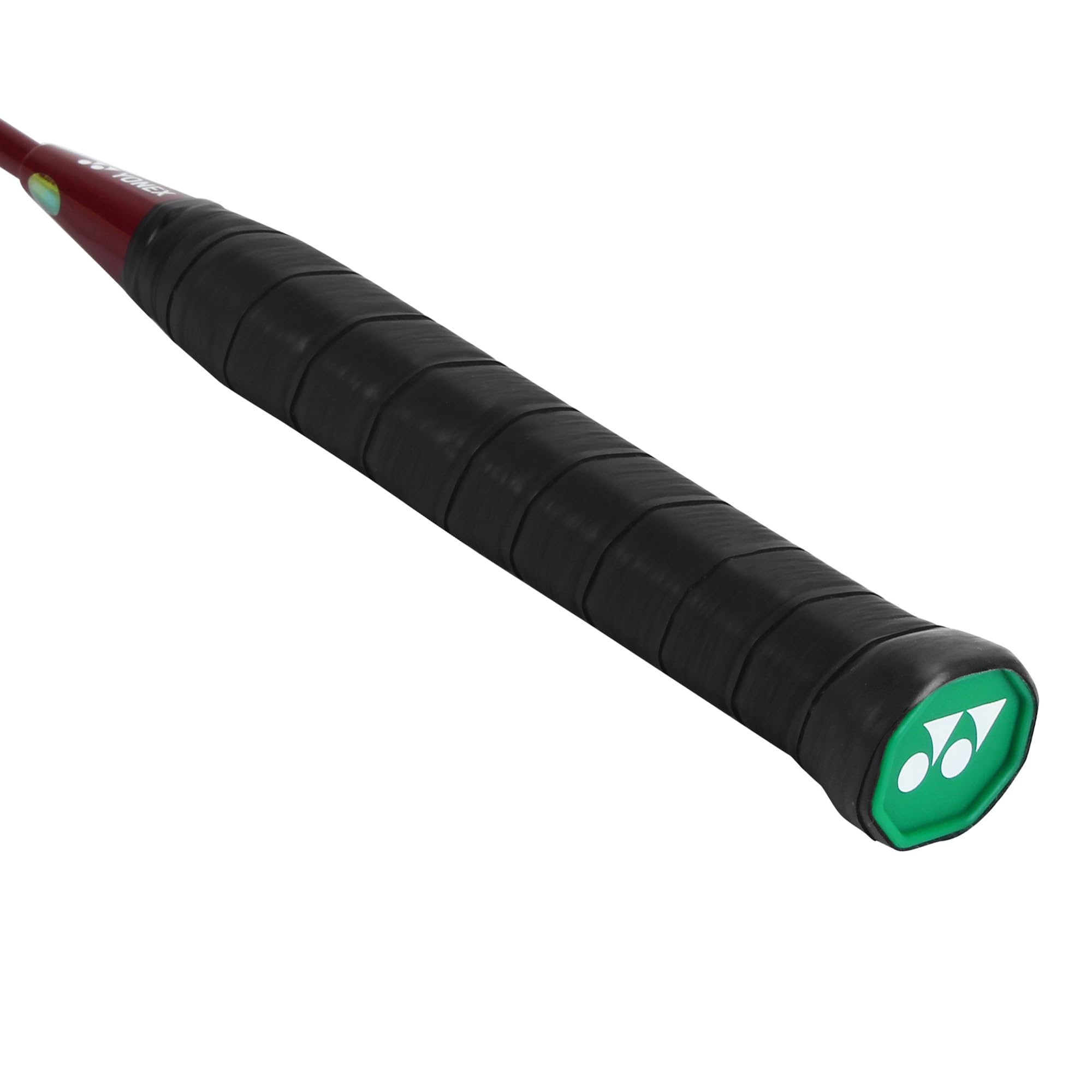 Yonex GR 303i next to shuttle for scale showing compact, easy-to-handle size