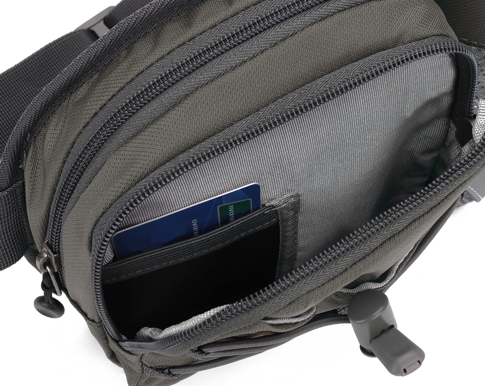 YUOTO pack with bottle beside hand for scale, shows compact capacity