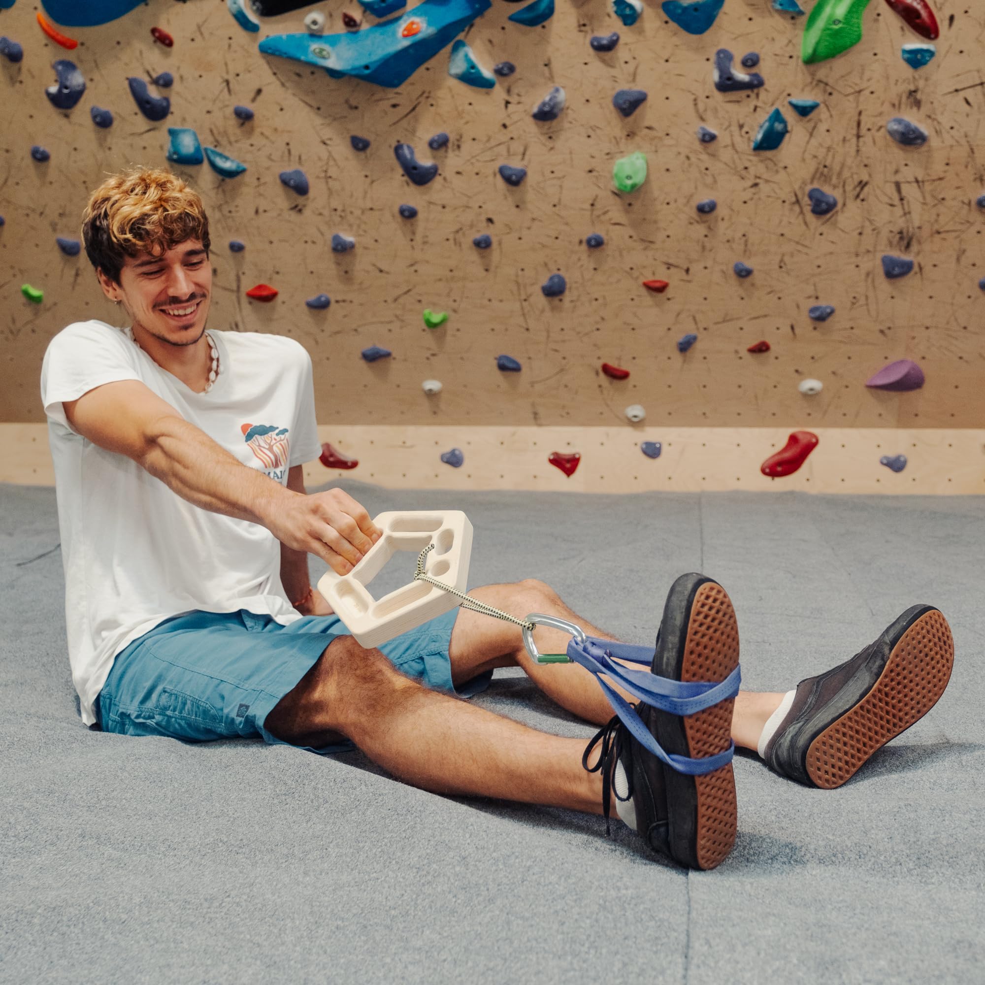 YY Vertical hangboards mounted in doorway demonstrating warm-up use