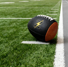 ZEESHINE player throwing the rebound football to build passing repetitions
