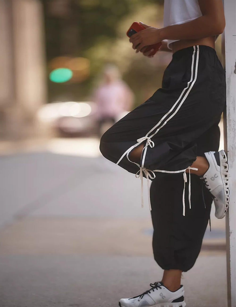 Zhiyouni model wearing pants outdoors illustrating mobility and breathability