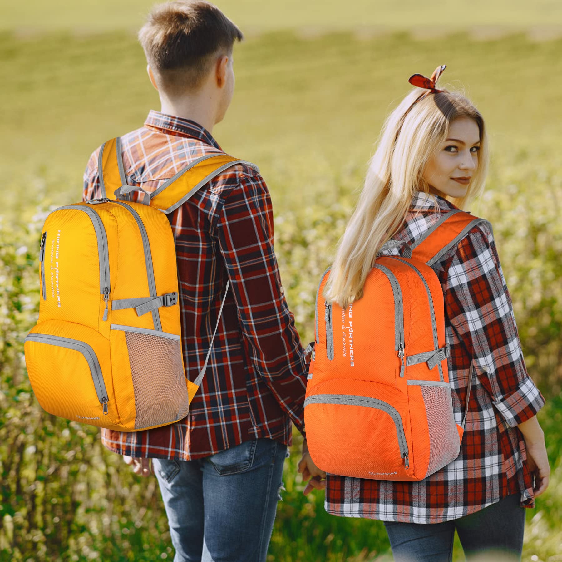 ZOMAKE beside suitcase showing compact folded size and large expanded capacity